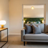 Elegant living room featuring cozy sofa and stylish decor showcasing the best furniture deals South Africa.