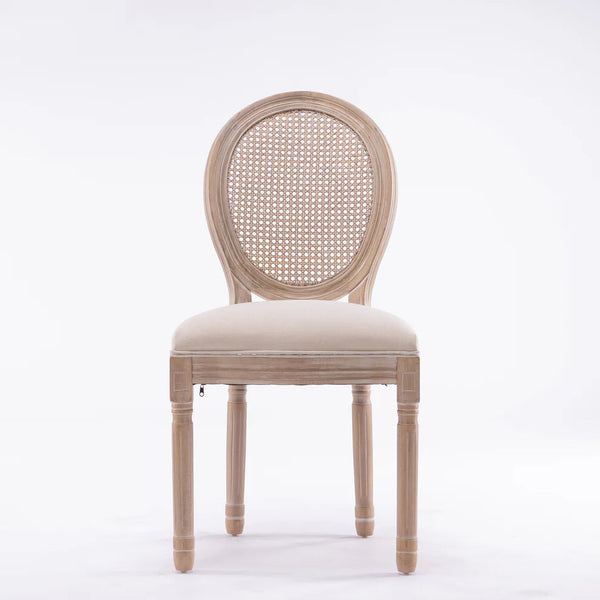 Vintage French Dining Chair with Rattan Back featuring a classic oval rattan backrest and wooden legs.