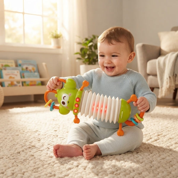 Baby playing with Lobster Accordion Musical Baby Toy in a bright room, smiling and exploring the toy.