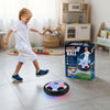 Child playing with LED Hover Soccer Ball in a bright indoor setting, showcasing the interactive features and box design.