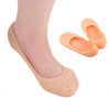 Close-up of a foot wearing a Silicone Moisturizing Sock with additional pair displayed, showcasing its soft silicone design.