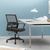 Mesh Ergo Office Chair – Breathable Adjustable Desk Chair in modern office setting with desk and lamp.