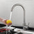 Stainless Steel Turn Sink Tap in action, showcasing water flow while washing a lemon.