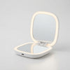 Portable Rechargeable Seashell LED Mirror with integrated lighting for everyday grooming.