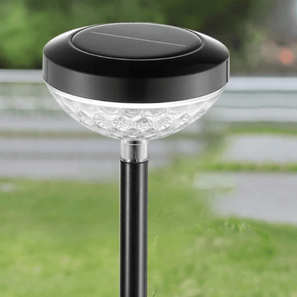 Solar Garden Lantern with a sleek design and solar panel for outdoor lighting in gardens and pathways.