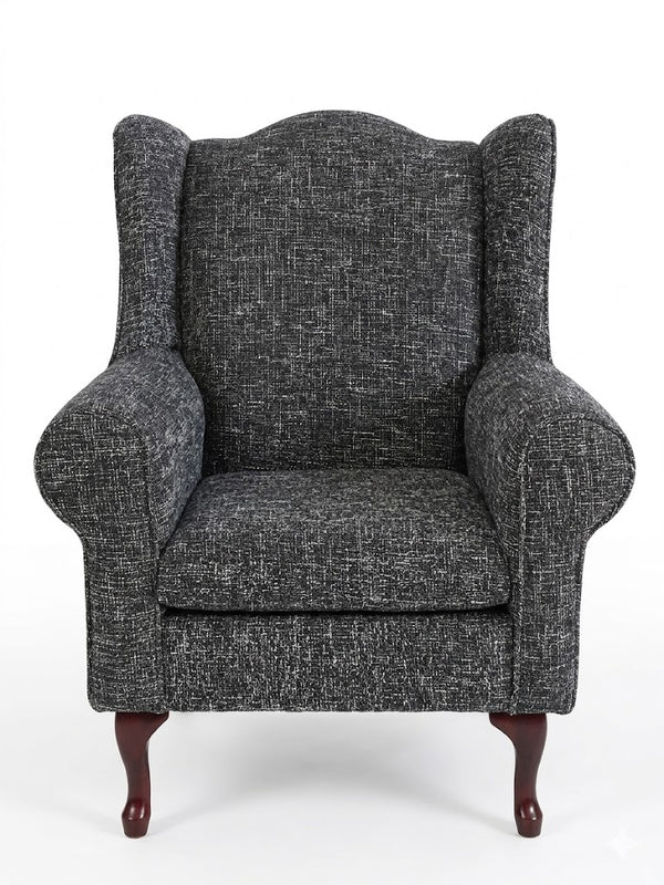Serena Grey Fabric Wingback Chair featuring a structured design and comfortable seating.