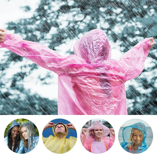 Person wearing a pink raincoat under rain, showcasing the Disposable Raincoat Ball features.