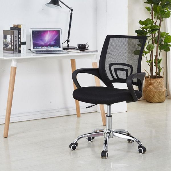 Ergonomic Mid-Back Mesh Office Chair with chrome base and smooth-rolling casters in a modern workspace.