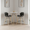 Urban Lounge Bar Chair set in modern corner with round table and decorative elements.