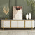 Arabelle Luxe Modern Marble Finish TV Stand with elegant decor and gold accents.