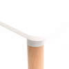 Corner view of the Modern Nordic Dining Table showcasing the smooth white surface and natural wood-look leg.