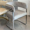 Luxury Tiffany Event and Dining Chair featuring a sleek design and modern chrome accents.