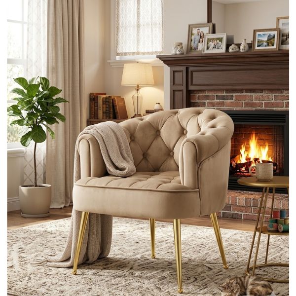 Luxury Tufted Velvet Barrel Dining Chair in a stylish living room with a cozy fireplace.