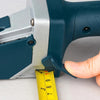 Close-up of the Professional Gypsum Board and Woodworking Cutting Tool measuring with a tape to ensure accurate cuts.