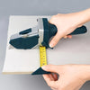 Professional Gypsum Board and Woodworking Cutting Tool in use measuring plasterboard with precise lines.