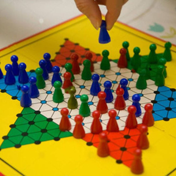 Classic Chinese Checkers Board Game with colorful pieces in strategic arrangement on the board.