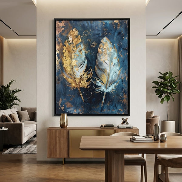 Framed Abstract Canvas Wall Art Piece featuring a blue background with gold and silver feather designs.