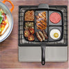 5 in 1 Magic Non Stick Frying Pan with various foods like chicken, sausages, eggs, and beans ready for cooking.