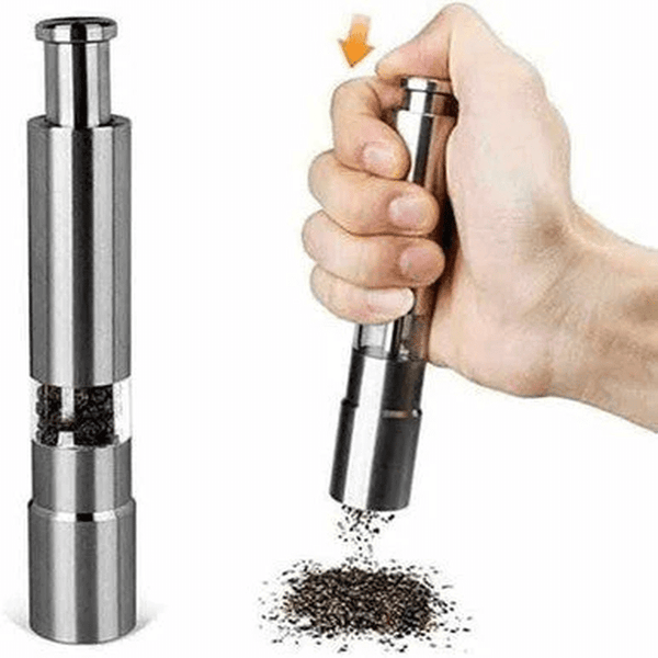 Chef Master Adjustable Salt & Pepper Grinder in use, showcasing precision grinding of spices for cooking and dining.