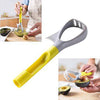 5 in 1 Avocado Tool for slicing, pitting, scooping, mashing, and storing avocados in a kitchen setting.