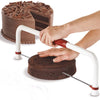 Big Cake Tierer in use to level a chocolate cake layer for tiered cake decoration.