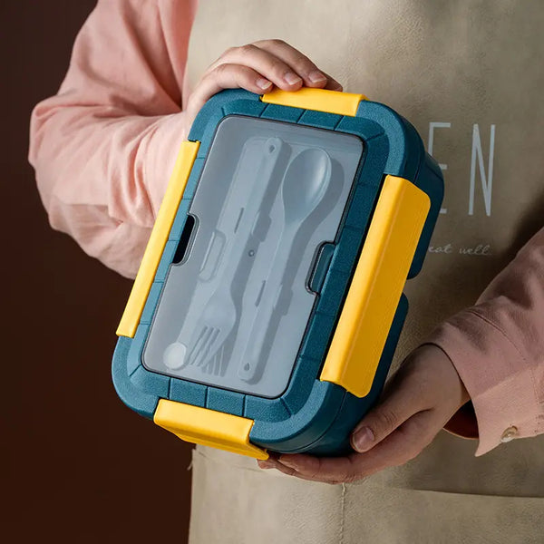 3-Compartment Microwave-Safe Bento Lunch Container with utensils for kids and office use.