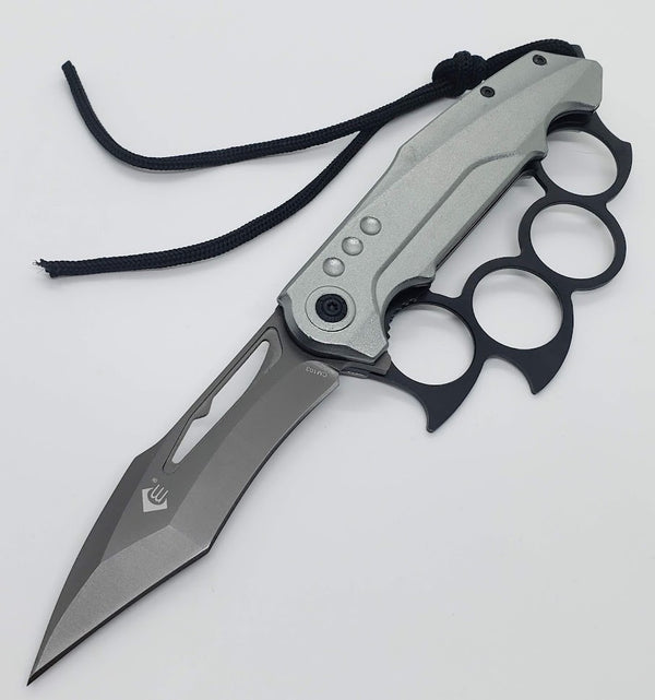 Tactical Trench Folding Knife with grip knuckle guard, suitable for outdoor and self-defense use.