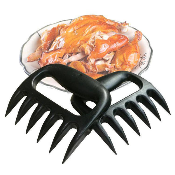 Braai Claws for shredding pulled chicken, featuring durable design for easy handling and heat resistance.