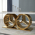 Modern Gold Double Ring Console Table with open double-ring frame design in a luxury setting.
