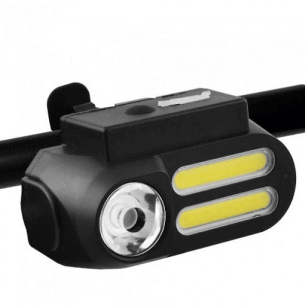USB Rechargeable Waterproof Bike Light mounted on a bicycle handlebar for enhanced nighttime visibility.
