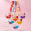 Heart-Shaped Liquid Glitter Keychain with colorful glitter and decorative elements in a charming display.