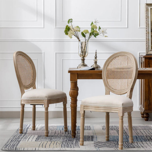 Vintage French Dining Chair with Rattan Back placed next to a wooden table in a stylish interior.