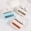 4-in-1 Acrylic Travel Refillable Bottles Set 50ml in blue, white, and pink, ideal for on-the-go liquid storage.