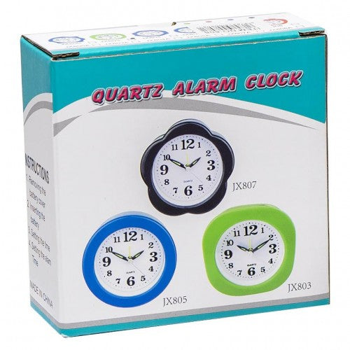 Mini Quartz Analog Desktop Alarm Clock packaging featuring three colorful clock designs.