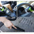 Portable Cordless Handheld Car Vacuum in action, cleaning car interior and floor mats effortlessly.