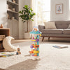 Flying Saucer Launch Tower Toy set up in a playroom, showcasing colorful interactive parts and a playful design.