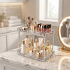 Double-Layer Water Ripple Beauty Organizer Shelf displaying cosmetics and beauty products on a stylish vanity countertop.