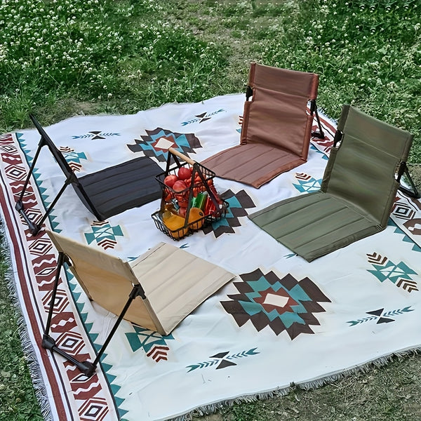 Ultra-Lightweight Folding Portable Camping Chair displayed on a patterned blanket with fruits.