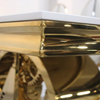 Close-up of the Modern Gold Double Ring Console Table showcasing its luxurious metallic finish and sleek design.