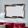 Ruby Wall Mirror with a modern, stylish frame enhancing room decor and reflecting light.
