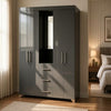 Multi-Door Bedroom Wardrobe with Built-In Central Mirror in a modern bedroom setting.