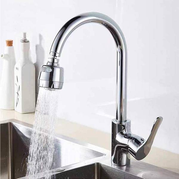 Anti-Splash Filter Nozzle Faucet Adapter in use, featuring a polished chrome finish and adjustable water flow for better control.
