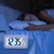 Smart Digital LCD Desk Clock with Temperature Display illuminating bedside in a dark room while a person peacefully sleeps.