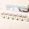 Magnetic Stainless Steel Spice Storage Box with six containers, ideal for organizing seasonings on metal surfaces.