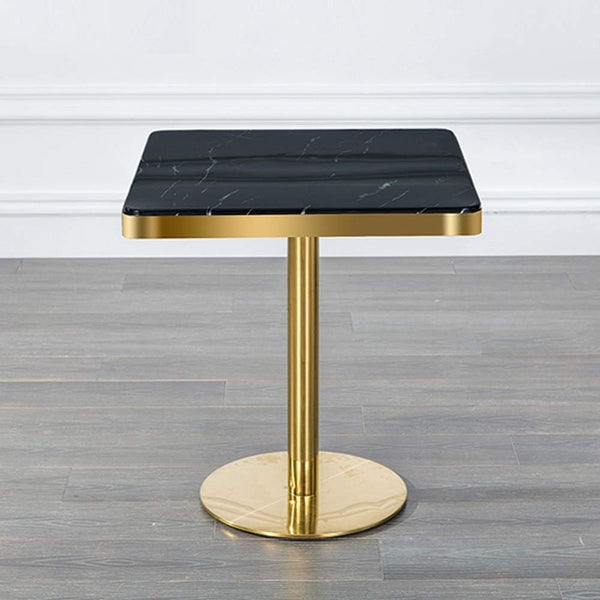 Square Marble Effect Dining Table with Gold Pedestal Base showcasing a sleek black marble top and polished gold pedestal.