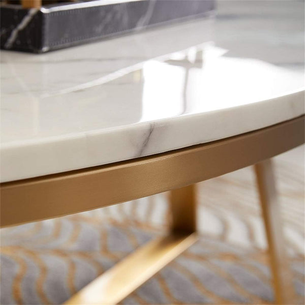Close-up of Oval Faux Marble Coffee Table with Gold Metal Base showcasing its elegant marble top and gold metal detailing.
