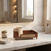 Brown 2-in-1 Rotating Cosmetic Organizer elegantly displayed on a marble dressing table.