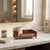 Brown 2-in-1 Rotating Cosmetic Organizer elegantly displayed on a marble dressing table.