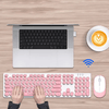 2.4 G Wireless Keyboard & Mouse Set in pink with laptop and coffee for a stylish workspace.