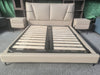 Modern Upholstered Bed Frame showing the sleek design and sturdy slat base for optimal mattress support.